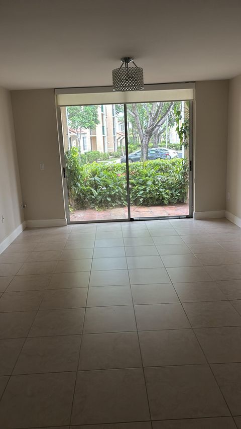 Photo of 1733 Village 110 Boulevard #110, West Palm Beach, FL 33409 (MLS # RX-11125194)