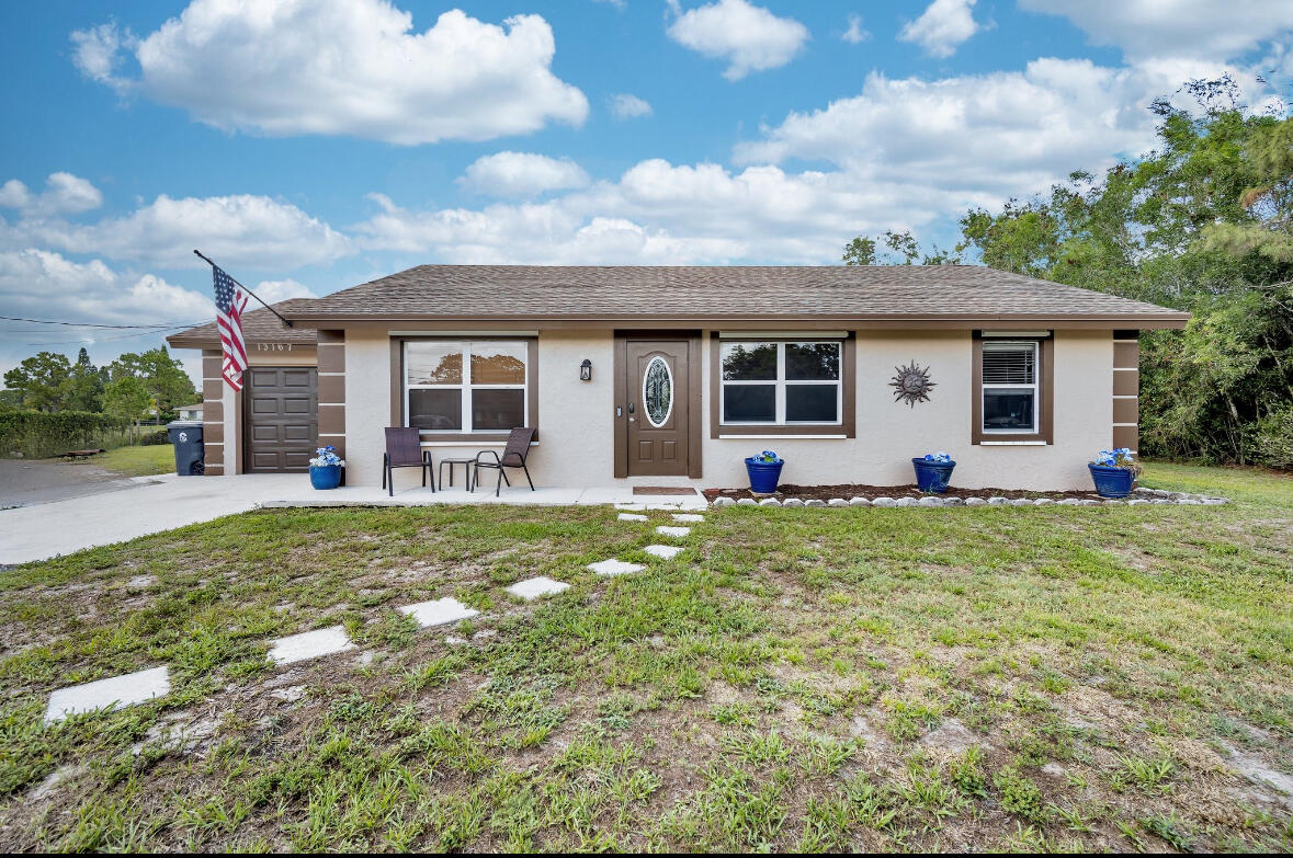Property for Sale at 13167 75th Lane, The Acreage, Palm Beach County, Florida - Bedrooms: 3 
Bathrooms: 2  - $499,999