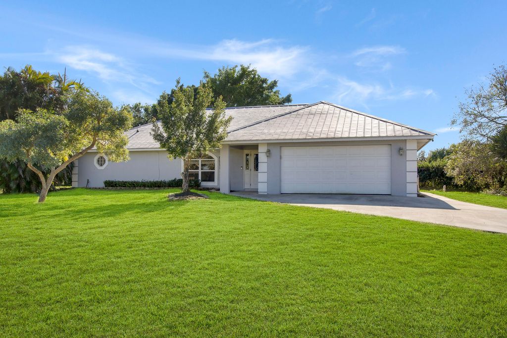 Photo of 310 Rosewood Drive, Fort Pierce, FL 34947 (MLS # RX-10857392)