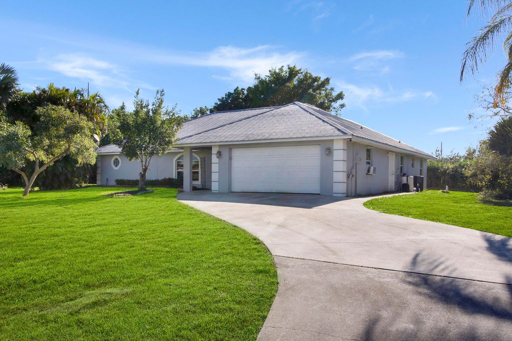 Photo of 310 Rosewood Drive, Fort Pierce, FL 34947 (MLS # RX-10857392)