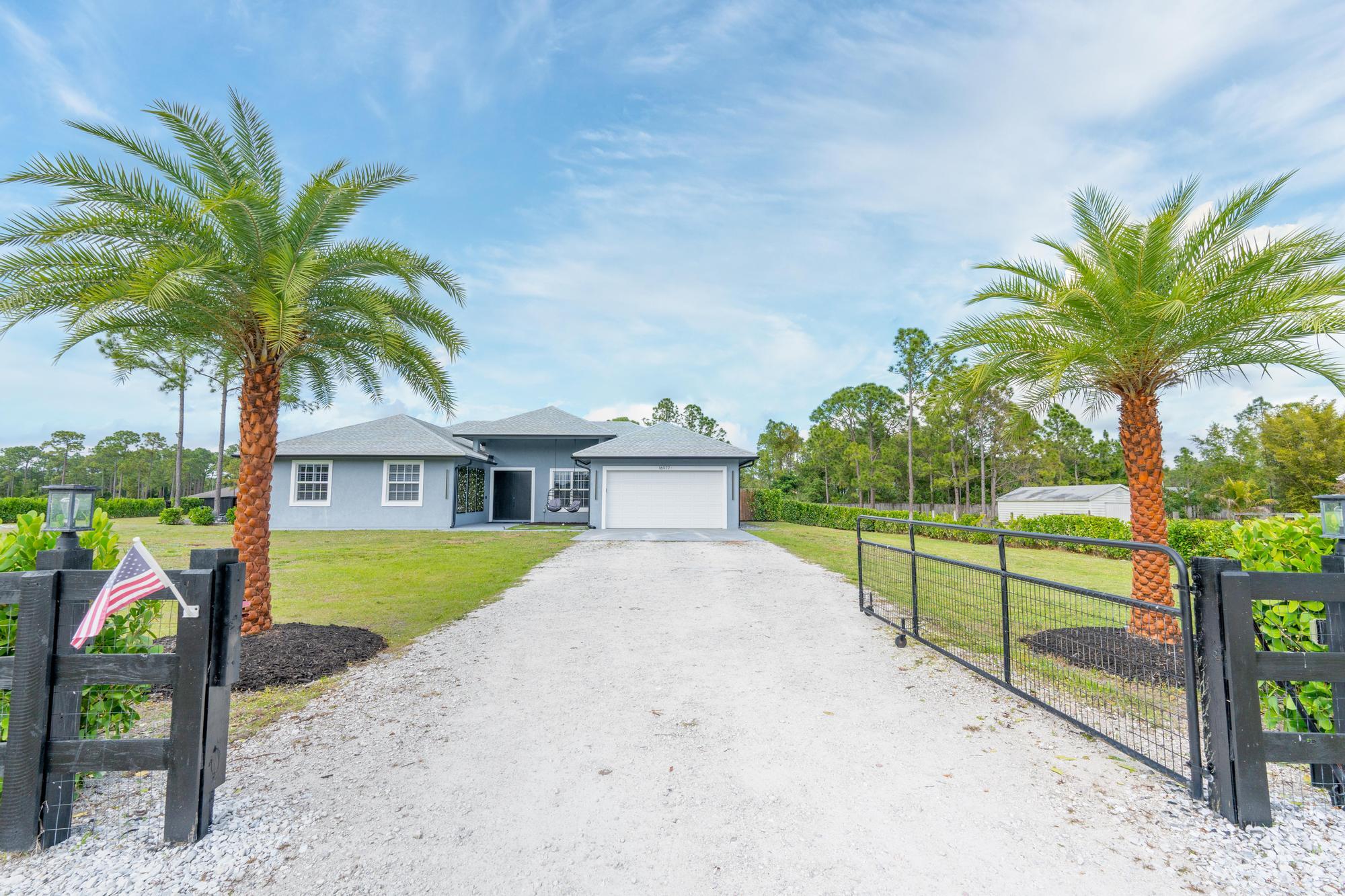 Property for Sale at 16977 76th Street, The Acreage, Palm Beach County, Florida - Bedrooms: 4 
Bathrooms: 2  - $815,000