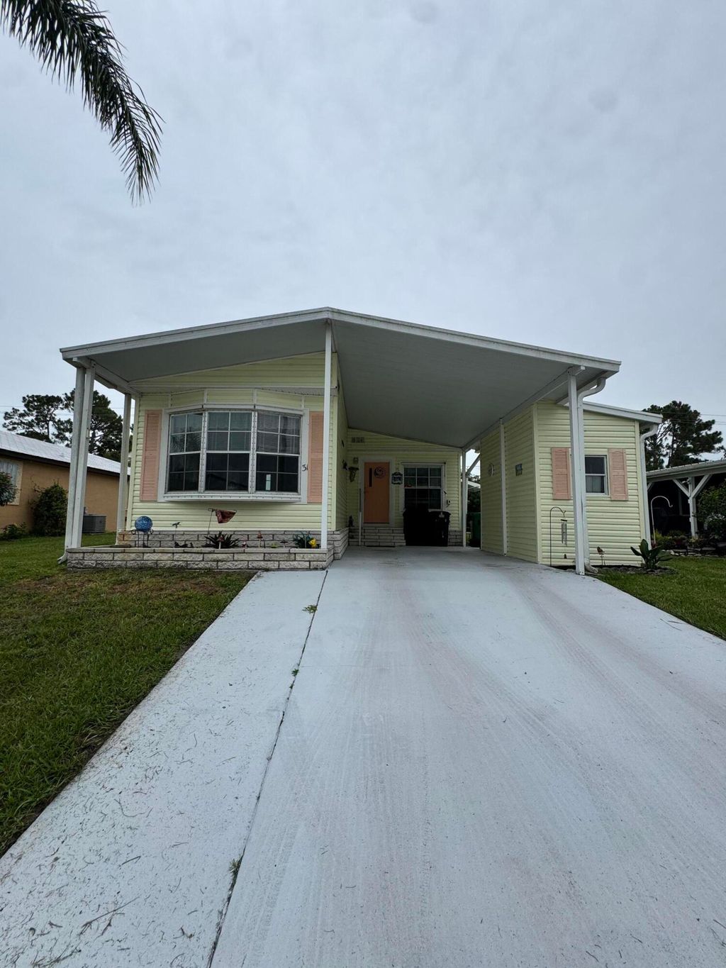 Photo of 31 Vista De Laguna, Fort Pierce, FL 34951 (MLS # RX-11096098)