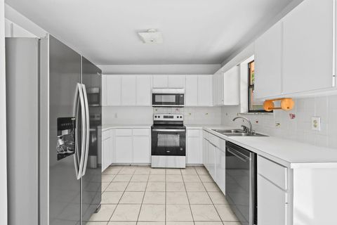 Photo of 2634 Summit Boulevard, West Palm Beach, FL 33406 (MLS # RX-11127970)