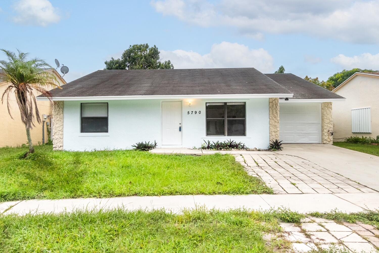 5790 Ithaca Circle, Lake Worth, Palm Beach County, Florida - 3 Bedrooms  
2 Bathrooms - 