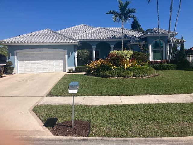 7043 Peninsula Court, Lake Worth, Palm Beach County, Florida - 3 Bedrooms  
2 Bathrooms - 