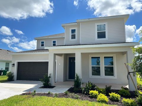 Photo of 9329 SW Lorenzo Way, Port Saint Lucie, FL 34987 (MLS # RX-11129008)