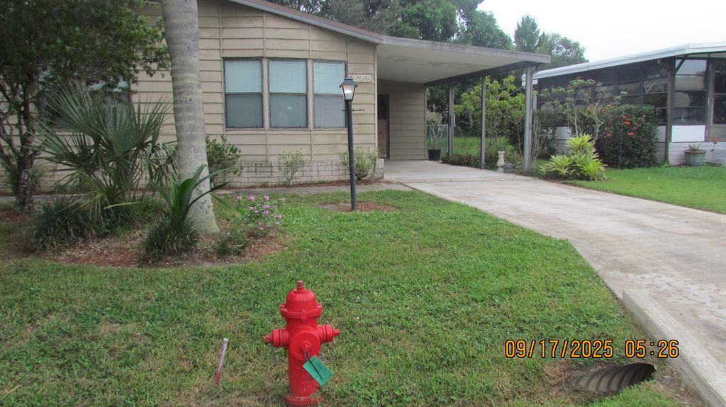 Photo of 2828 SW Toronado Trail, Stuart, FL 34997 (MLS # RX-11076295)