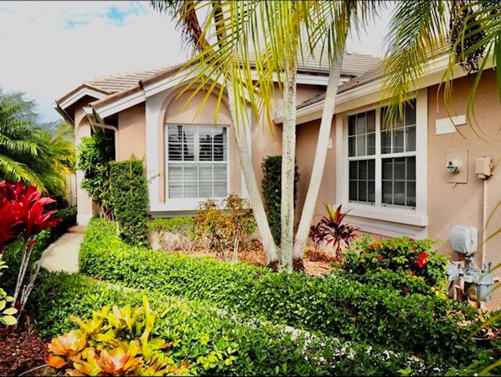 Photo of 331 Eagleton Golf Drive, Palm Beach Gardens, FL 33418 (MLS # RX-10899512)