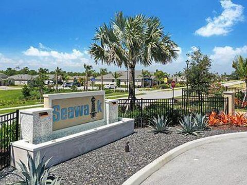Photo of 1343 NE White Pine Terrace, Jensen Beach, FL 34957 (MLS # RX-11109851)