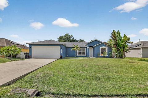 Photo of 790 NW Bayard Avenue, Port Saint Lucie, FL 34983 (MLS # RX-11128665)