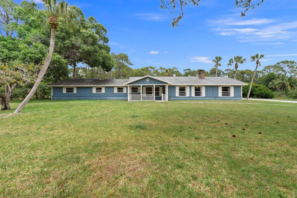 Photo of 6325 SW Gator Trail, Palm City, FL 34990 (MLS # RX-11084521)