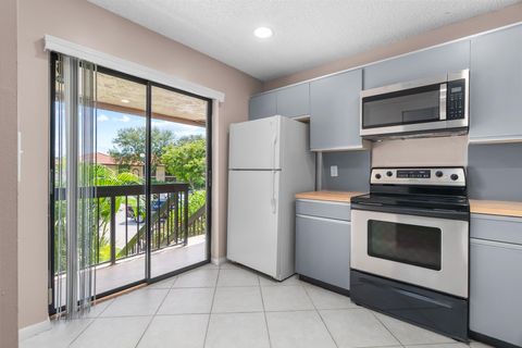 Photo of 5201 W Club Circle #203, Boca Raton, FL 33487 (MLS # RX-11129346)
