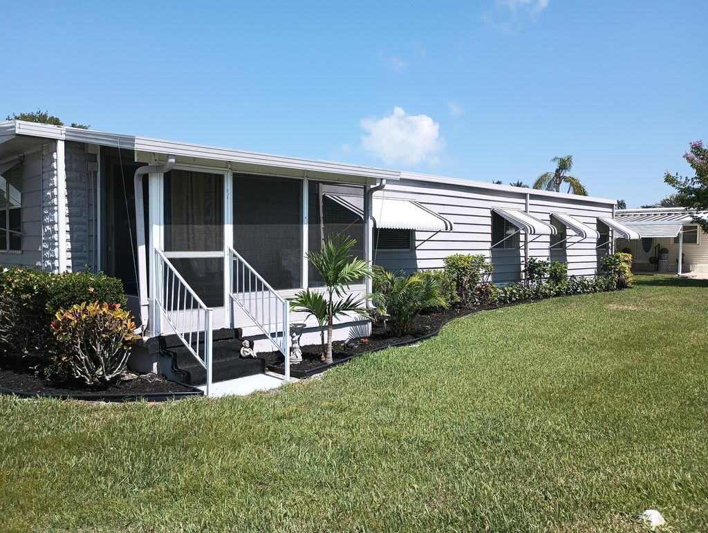 Photo of 278 NE Cameo Way, Jensen Beach, FL 34957 (MLS # RX-11095281)
