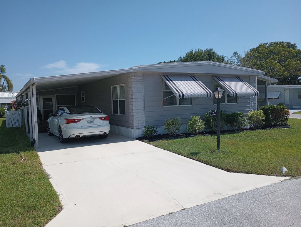 Photo of 278 NE Cameo Way, Jensen Beach, FL 34957 (MLS # RX-11095281)