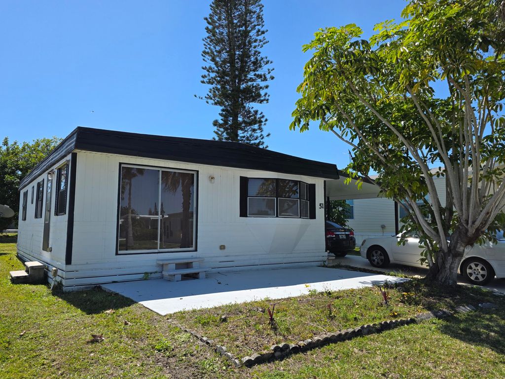 Photo of 51 El Camino Real Real, Port Saint Lucie, FL 34952 (MLS # RX-11071691)