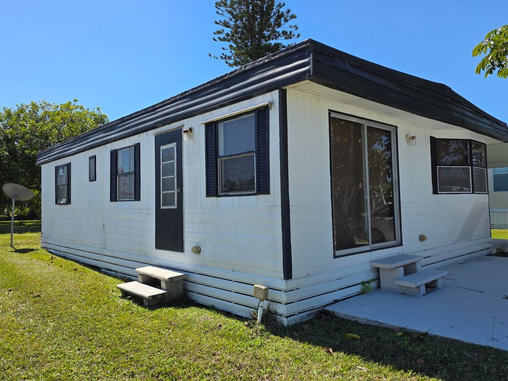 Photo of 51 El Camino Real Real, Port Saint Lucie, FL 34952 (MLS # RX-11071691)