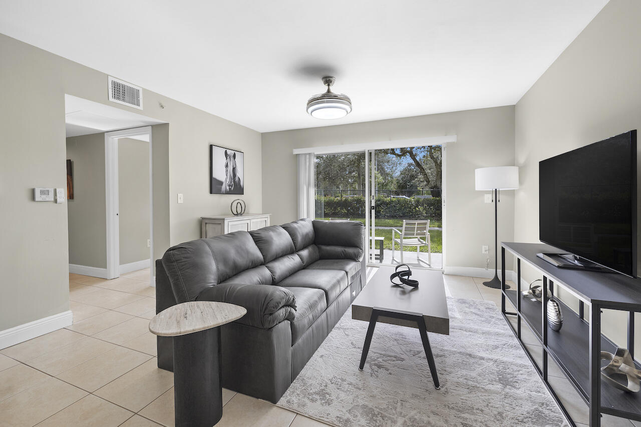 Property for Sale at 1400 Crestwood Court 1401, Royal Palm Beach, Palm Beach County, Florida - Bedrooms: 4 
Bathrooms: 2  - $359,000