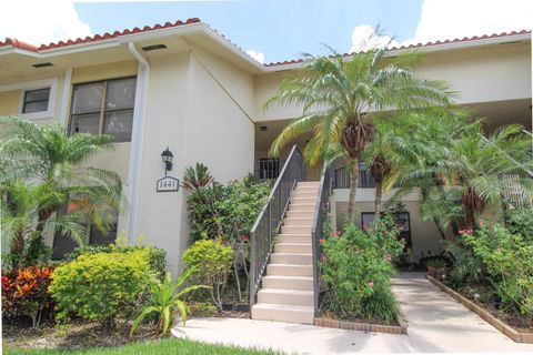 Photo of 1441 Windorah Way #F, West Palm Beach, FL 33411 (MLS # RX-11125963)
