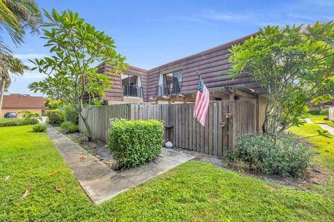 Photo of 1914 19th Lane, Palm Beach Gardens, FL 33418 (MLS # RX-11129767)