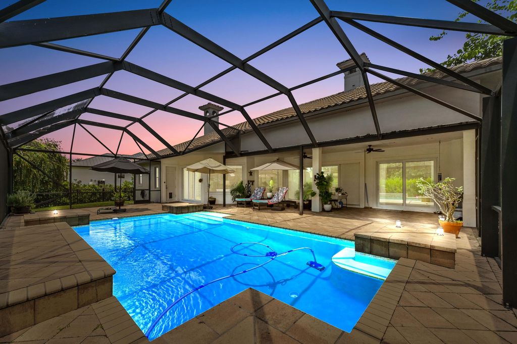 Photo of 908 SW Squire Johns Lane, Palm City, FL 34990 (MLS # RX-11101386)