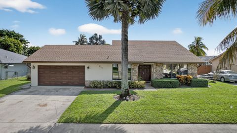 Photo of 185 Bobwhite Road, Royal Palm Beach, FL 33411 (MLS # RX-11123350)