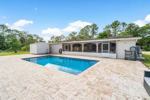 Photo of 12275 N 56th Place N, West Palm Beach, FL 33411 (MLS # RX-11124198)