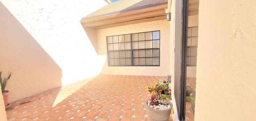 Photo of 11194 Curry Drive, Palm Beach Gardens, FL 33418 (MLS # RX-10967357)