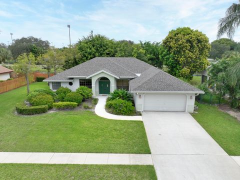 Photo of 13676 Folkestone Court, Wellington, FL 33414 (MLS # RX-11119450)