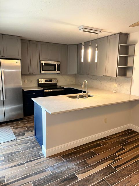 Photo of 2324 23rd Court #55d, Jupiter, FL 33477 (MLS # RX-11127493)