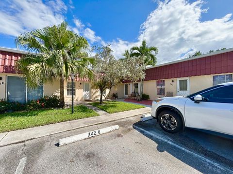 Photo of 342 Covered Bridge Boulevard #B, Lake Worth, FL 33467 (MLS # RX-11128868)