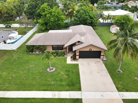 Photo of 145 Santa Monica Avenue, Royal Palm Beach, FL 33411 (MLS # RX-11117770)