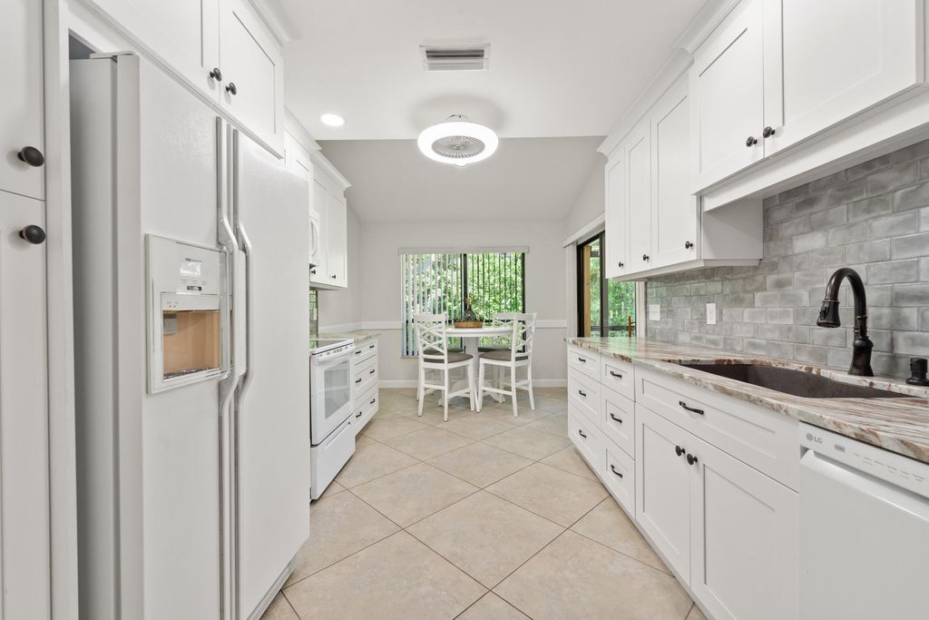 Photo of 7906 SE Trenton Avenue, Hobe Sound, FL 33455 (MLS # RX-11103958)