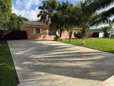Photo of 9179 Melody Road, Lake Worth, FL 33467 (MLS # RX-11129617)