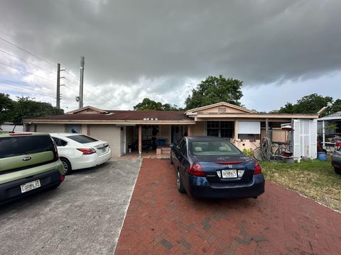 Photo of 3197 NW 100 Street, Miami, FL 33147 (MLS # RX-11114002)