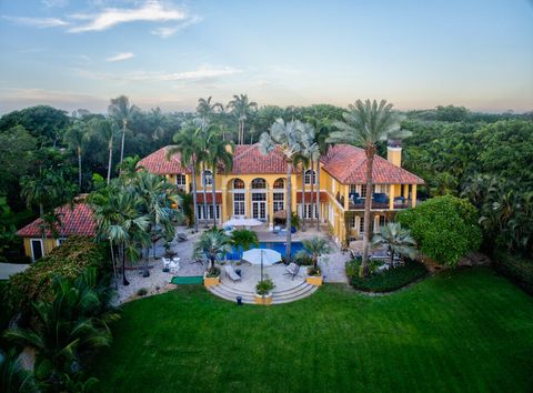 Photo of 12267 Channel Drive, North Palm Beach, FL 33408 (MLS # RX-11112974)