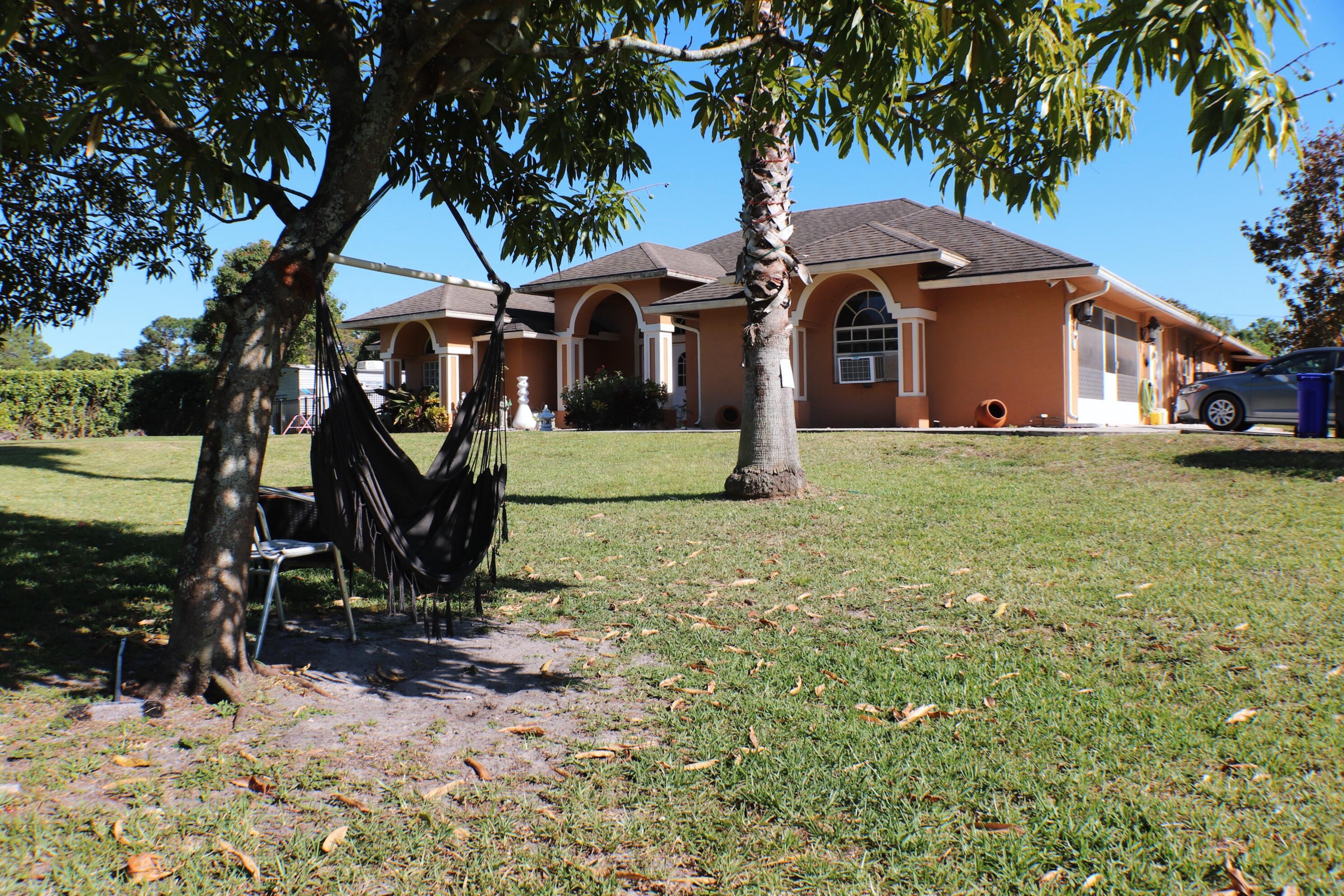 Property for Sale at 13084 73rd Street, The Acreage, Palm Beach County, Florida - Bedrooms: 3 
Bathrooms: 3  - $825,000