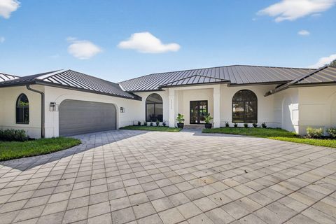Photo of 18240 SE Heritage Drive, Tequesta, FL 33469 (MLS # RX-11118518)