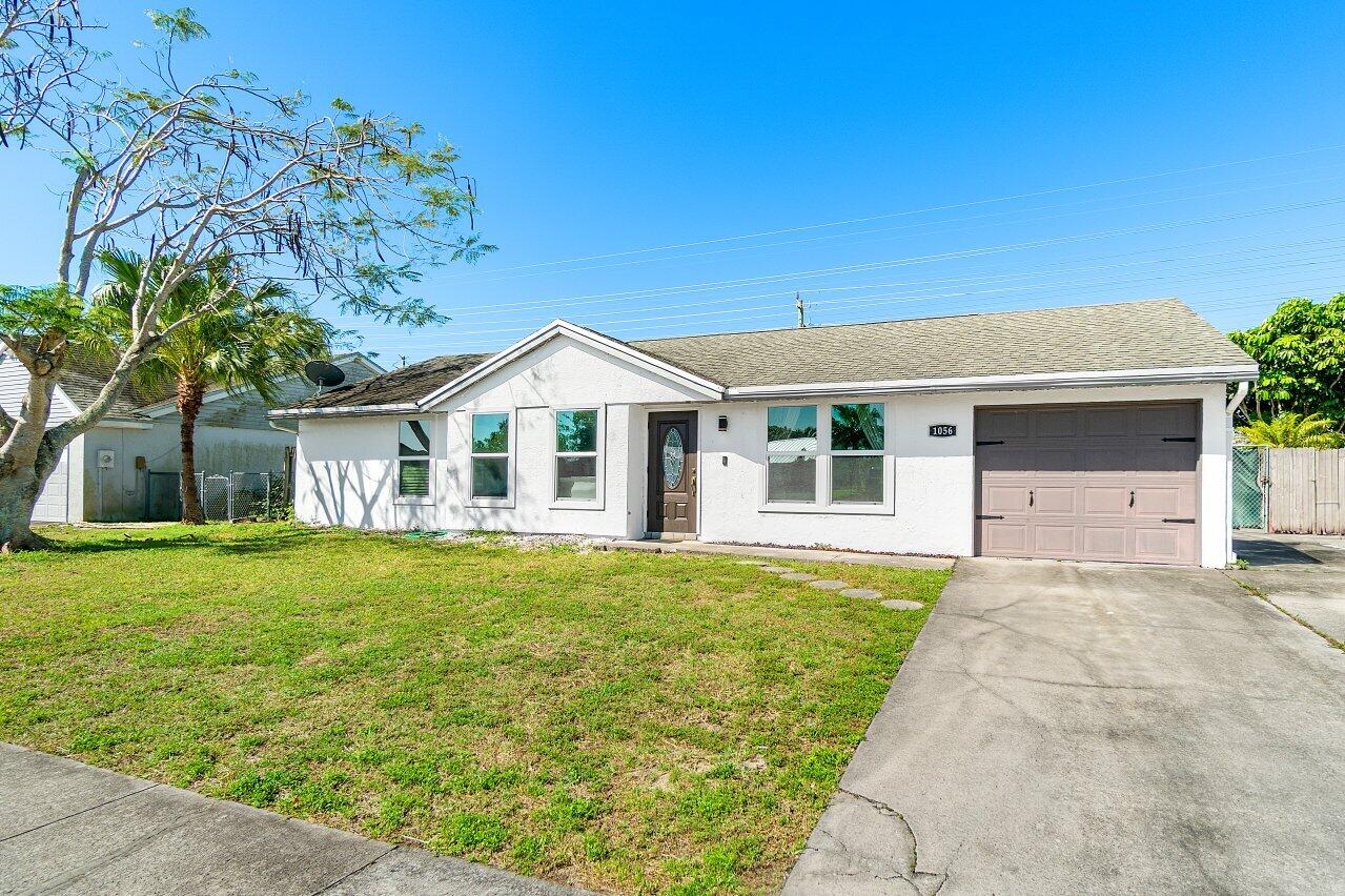 Property for Sale at 1056 Grandview Circle, Royal Palm Beach, Palm Beach County, Florida - Bedrooms: 3 
Bathrooms: 2  - $499,900