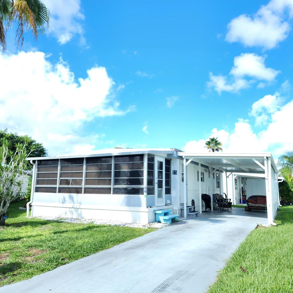 Photo of 15 Indigo Lane, Port Saint Lucie, FL 34952 (MLS # RX-11125501)