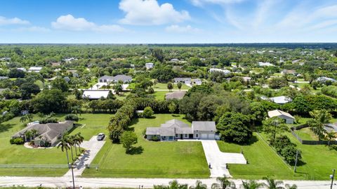 Photo of 16185 72nd Drive N, Palm Beach Gardens, FL 33418 (MLS # RX-11125208)