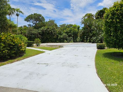Photo of 958 NE Dahoon Terrace, Jensen Beach, FL 34957 (MLS # RX-11096542)