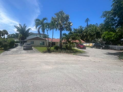 Photo of 2081 Joy Rene Lane, North Palm Beach, FL 33408 (MLS # RX-11076359)