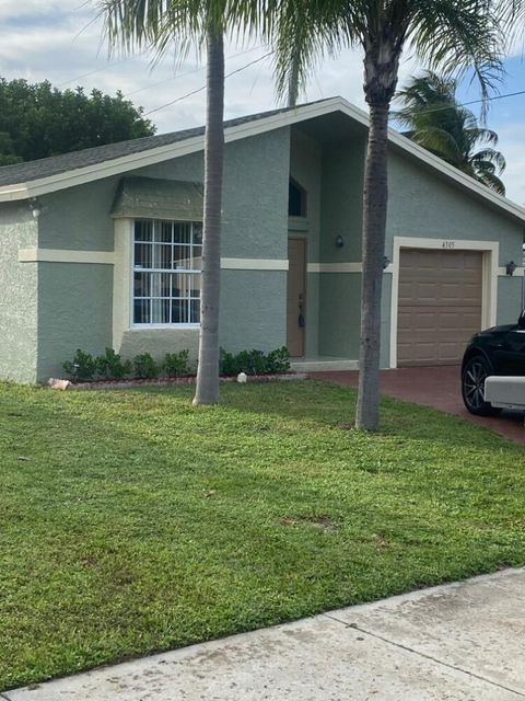 Photo of 4305 Greenwood Avenue E, West Palm Beach, FL 33407 (MLS # RX-11125753)