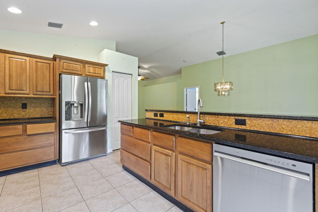 Photo of 2683 SW Marquis Terrace, Stuart, FL 34997 (MLS # RX-11095077)