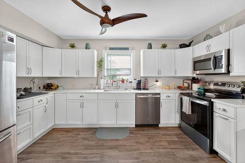 Photo of 6379 SE Lake Circle Drive, Stuart, FL 34997 (MLS # RX-11122021)