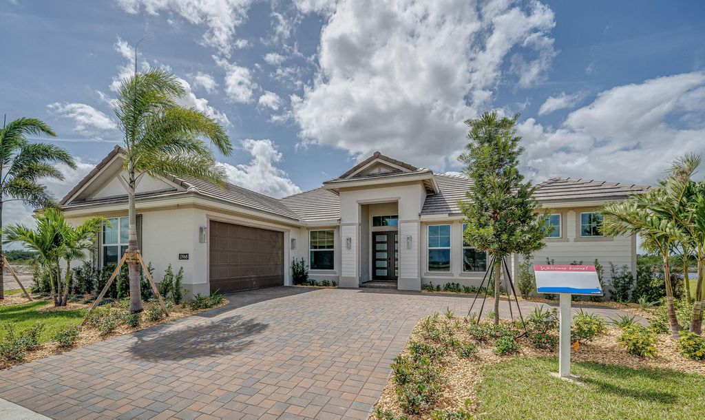 Photo of 13968 SW Belterra Drive, Port Saint Lucie, FL 34987 (MLS # RX-11112789)