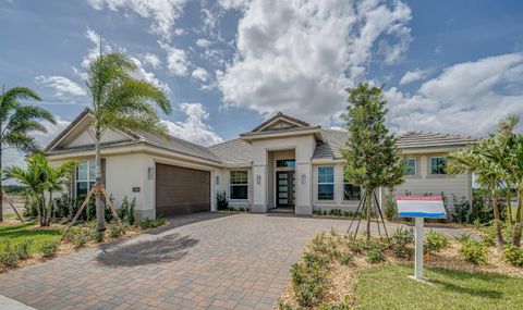 Photo of 13968 SW Belterra Drive, Port Saint Lucie, FL 34987 (MLS # RX-11112789)