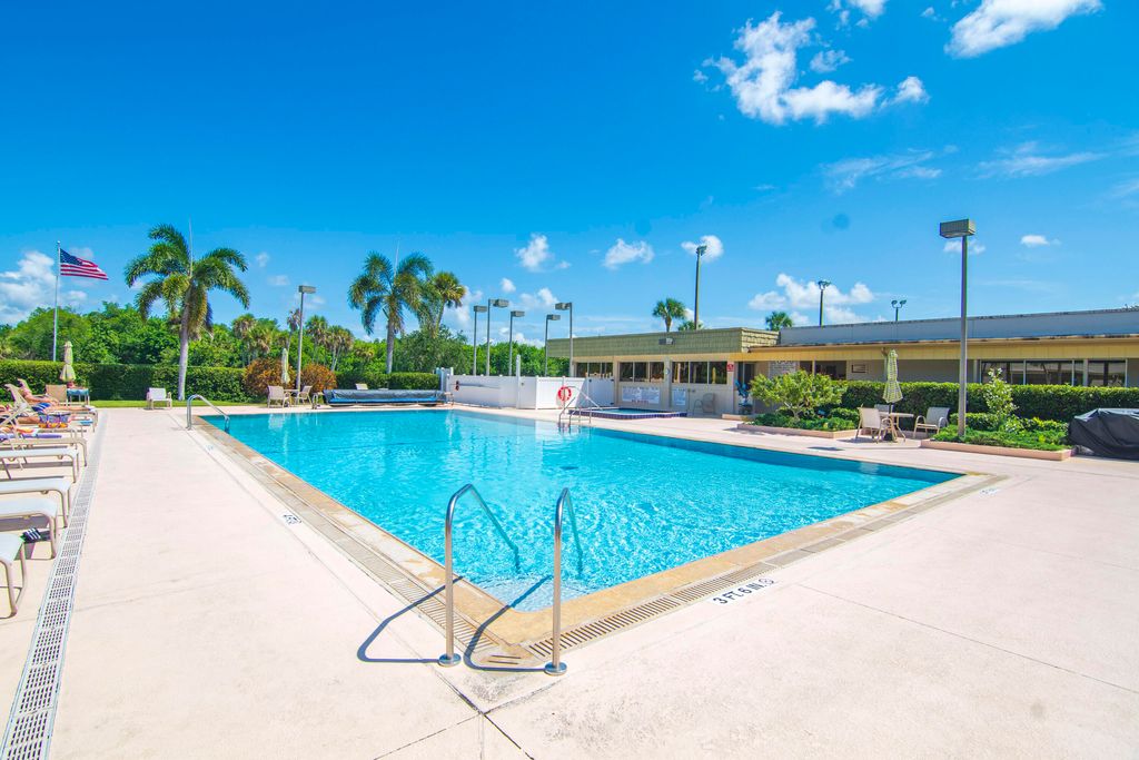 Photo of 16 Vista Gardens Trail Trl #105, Vero Beach, FL 32962 (MLS # RX-11125947)