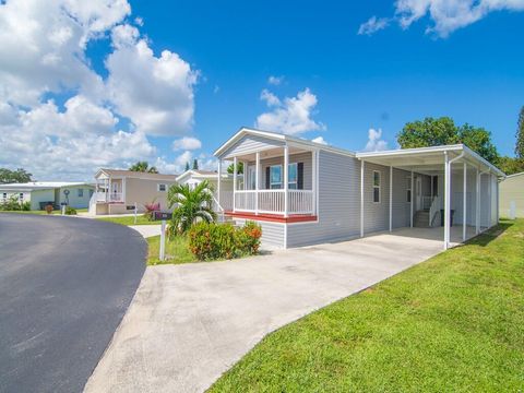 Photo of 121 Sandhill Boulevard, Fort Pierce, FL 34982 (MLS # RX-11129575)
