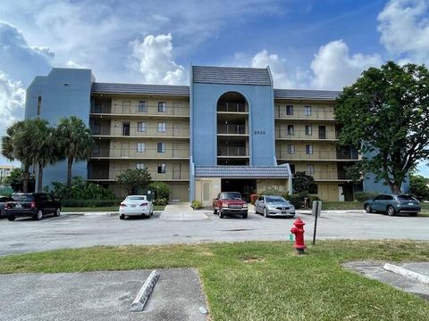 Photo of 2828 Tennis Club Drive #303, West Palm Beach, FL 33417 (MLS # RX-11125097)